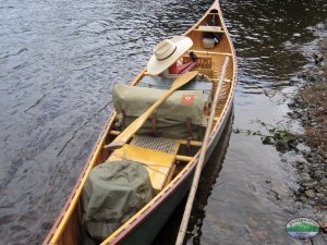 wood canvas canoe on a maine river