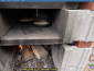 Sourdough bread baking in an outdoor oven