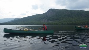 paddling past the mountain of Baxter state park, Maine