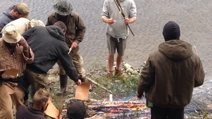 Rock boiling in birch baskets by the river