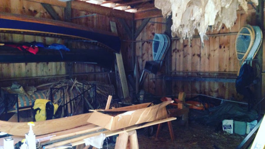 Organizing the barn this AM: canoe mold, deer hides, traps, snowshoe molds, tools, pack basket materials, knife blanks, etc