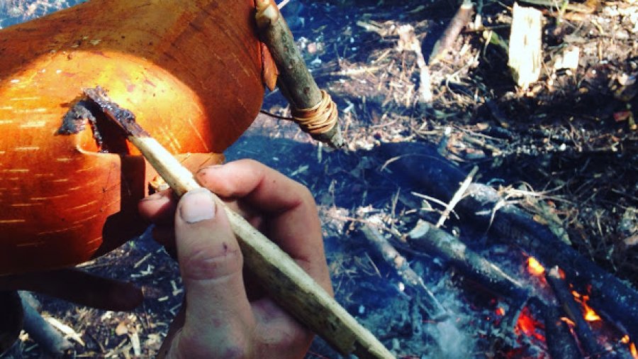 Sealing a crack in a birch bowl with pitch to make it water tight
