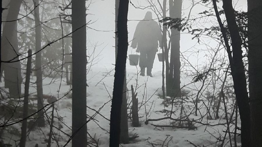 Carrying Water Pails In The Mist
