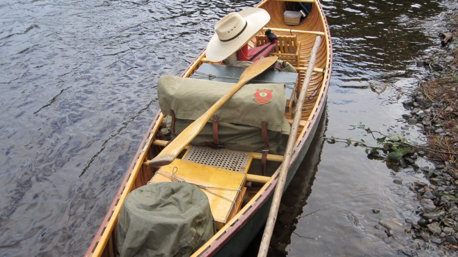 wood canvas canoe on a maine river