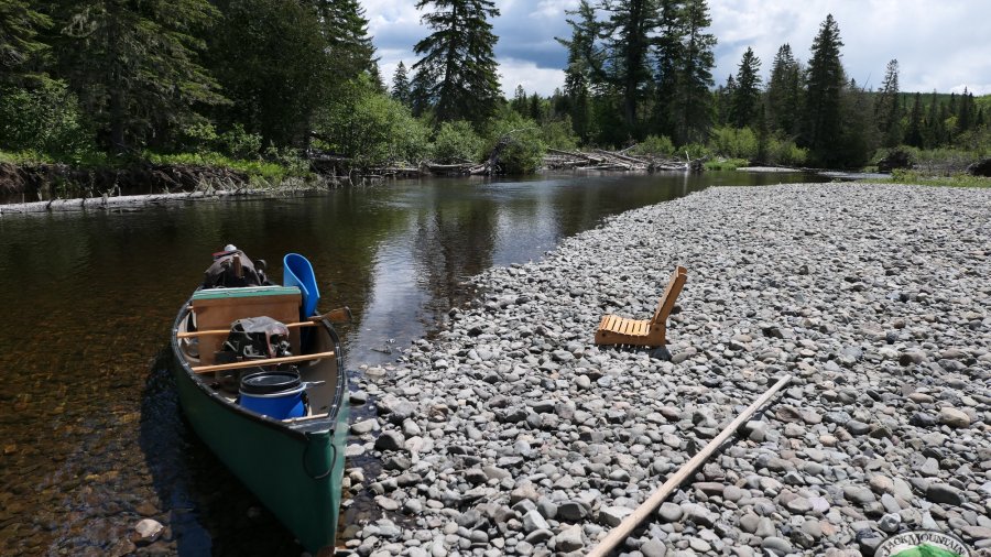 canoe chair on a gravel bar
