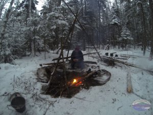 Cooking on a fire in winter.