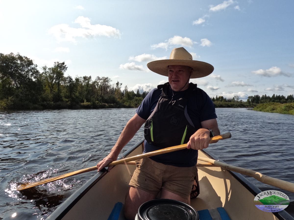 Tim canoeing in a remote area