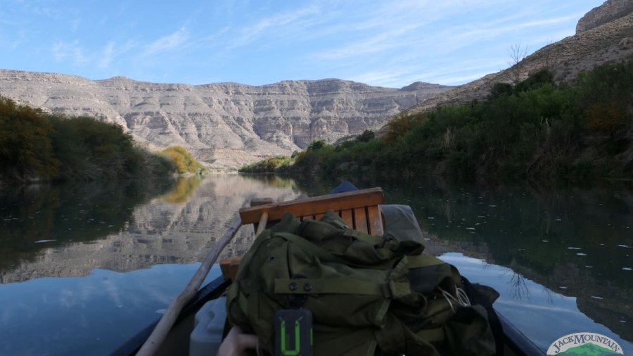 View of the distant canyon wall from a canoe on the Rio Grande.
