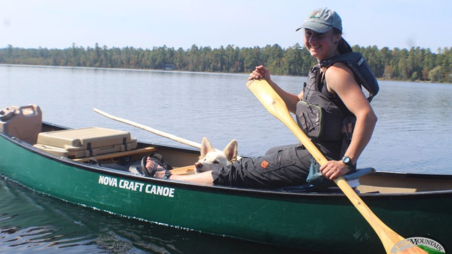 Sam paddling a canoe