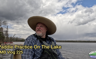 Tim in a canoe on a local lake. Paddle practice in canoes.