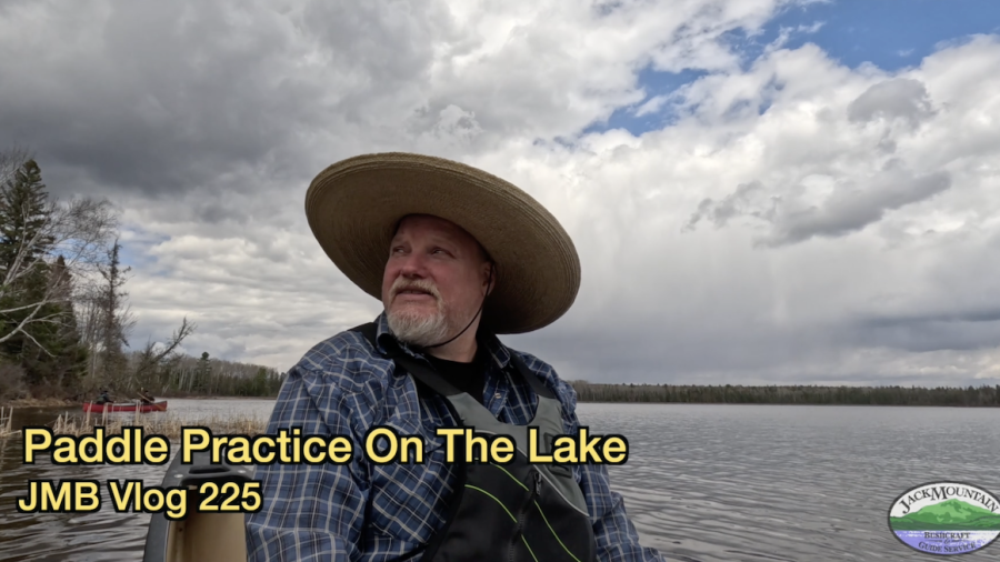 Tim in a canoe on a local lake. Paddle practice in canoes.