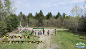 Group working on tying a flip flop winch