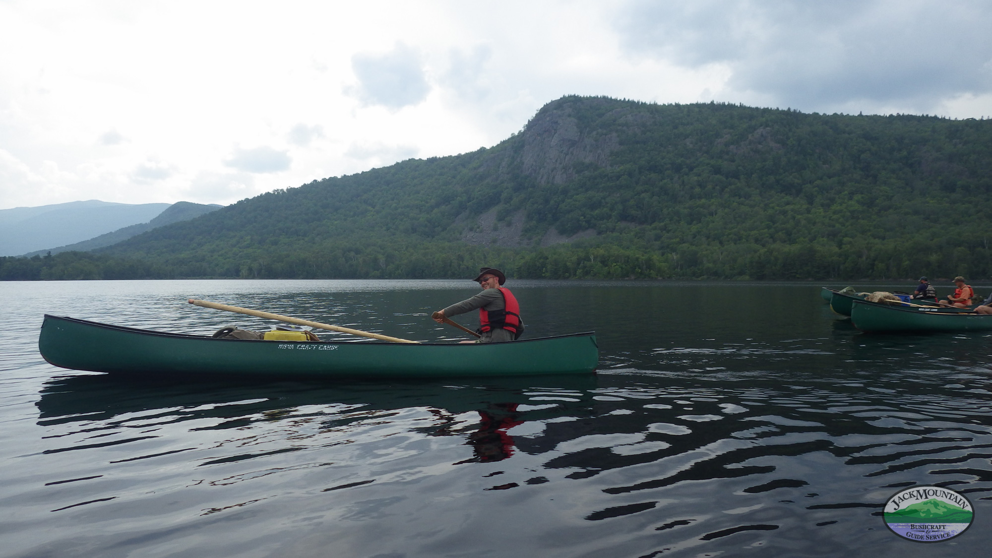 paddling past the mountain of Baxter state park, Maine